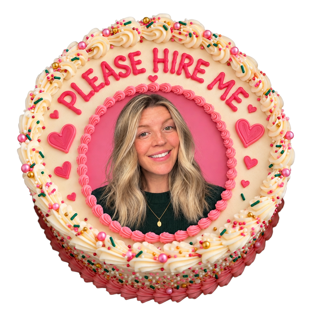 Kaleigh’s portrait on a pink and cream cake reading PLEASE HIRE ME
